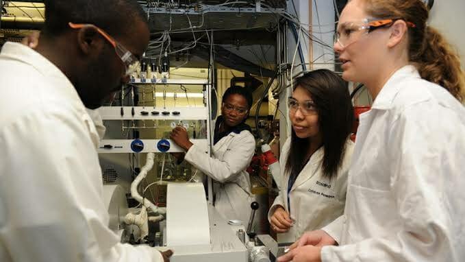 Researchers doing work in laboratory